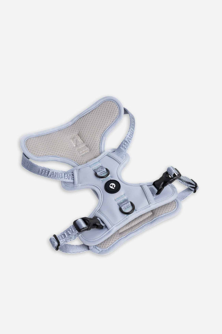 Dusk Blue Cloud Harness with Traditional Buckles laying flat on white floor