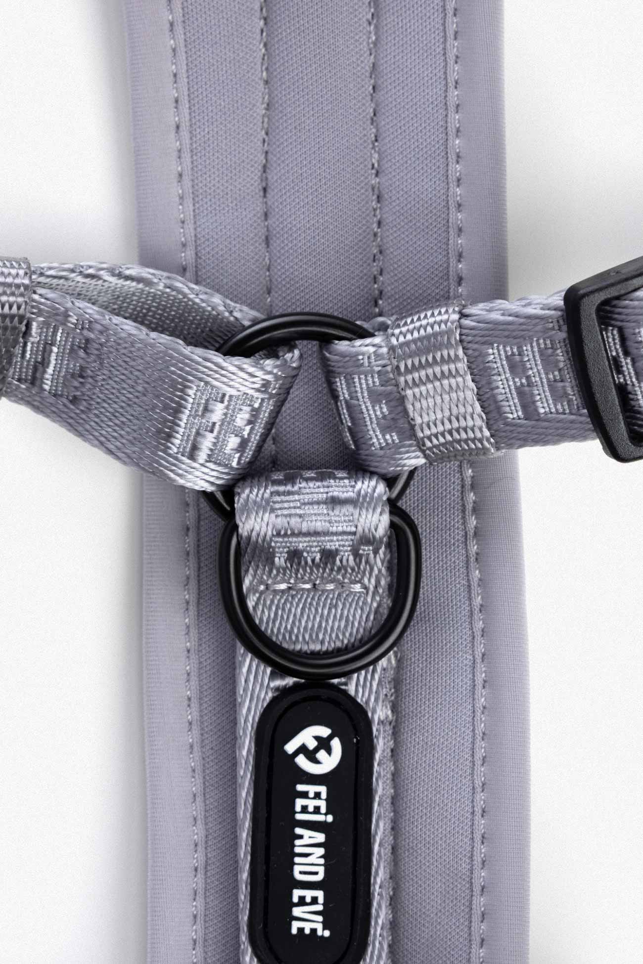 Twilight Gray Moxie Harness close-up of a gray dog harness with black buckles and 'FEI AND EVE' branding
